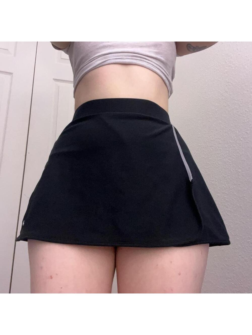 black mini Nike tennis skirt
